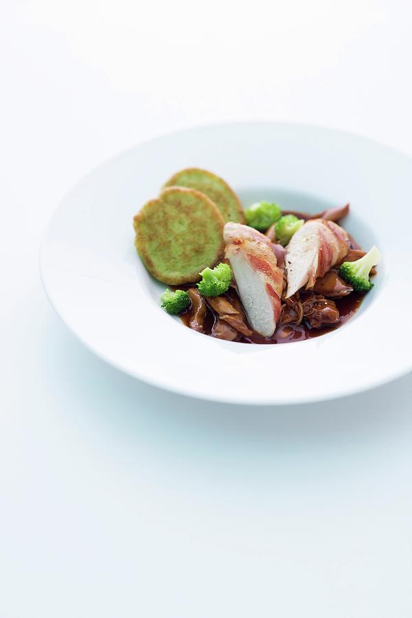 Duo Of Rabbit With Broccoli Biscuits Photograph by Michael Wissing