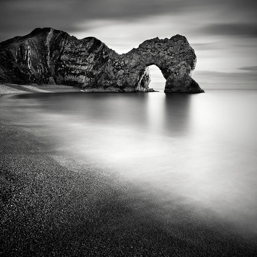 Black And White Photograph - Durdle Door by Rob Cherry