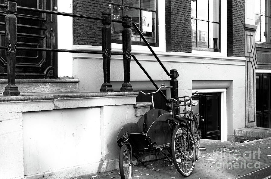Dutch Bike Waiting in Amsterdam Photograph by John Rizzuto