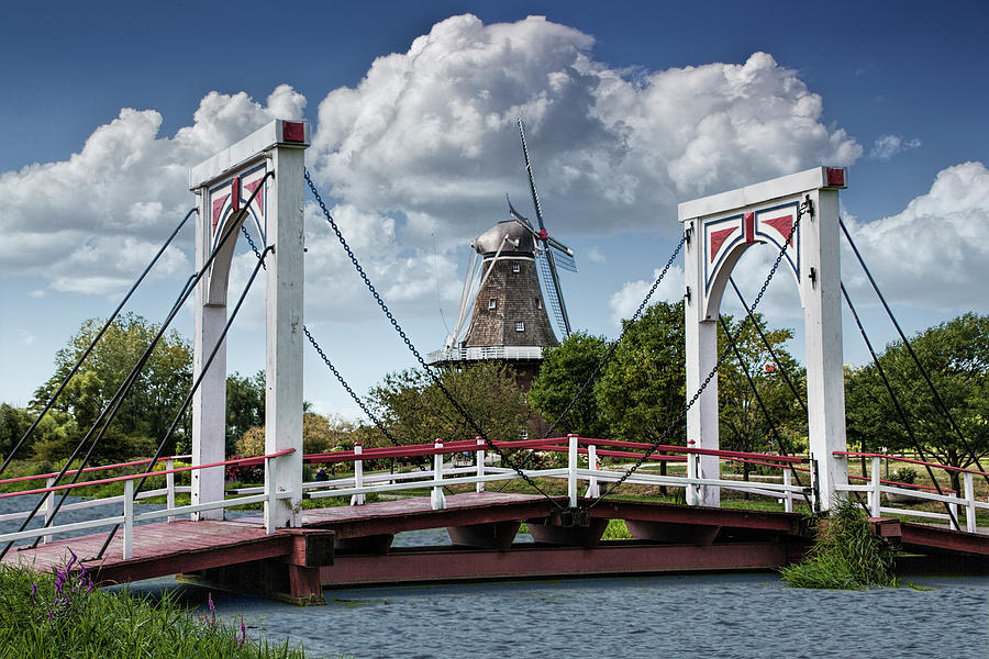 Dutch Bridge and the deZwaan Windmill at Windmill Island in Holl Photograph by Randall Nyhof