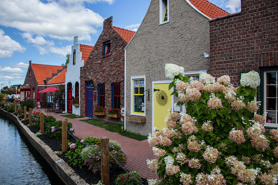 Dutch Shops along a Canal in Dutch Village Photograph by Randall Nyhof