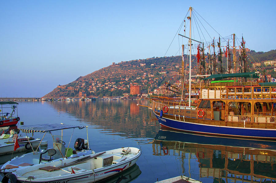 Early morning at the harbor of Alanya Photograph by Sun Travels