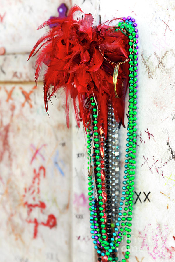 Earrings for Marie Laveau at St. Louis Cemetery in New Orleans Photograph by John Rizzuto