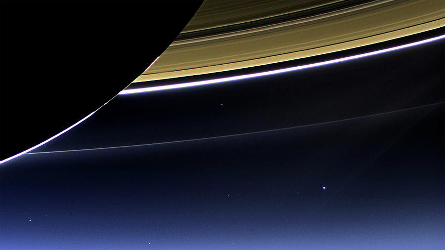 Earth and Saturn  Photograph by Doc Braham