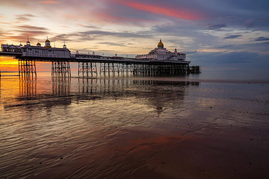 Eastbourne pier in England seen at sunrise. Photograph by George ...