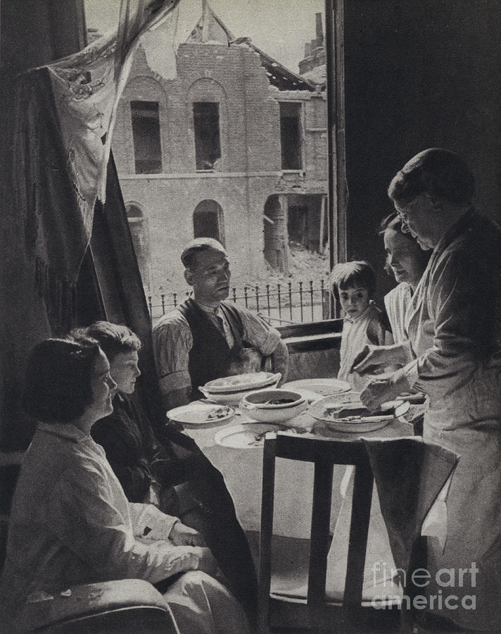 Eastenders Eating Dinner During The Blitz Photograph by English Photographer