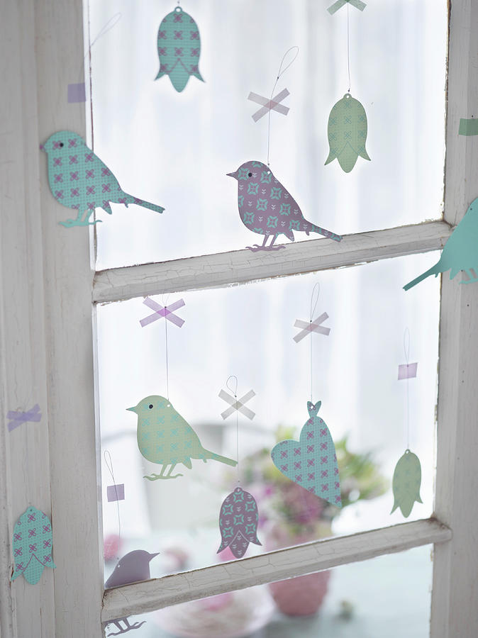 Easter Arrangement Of Metal Pendants In Window birds, Flowers, Hearts Photograph by Julia Hoersch