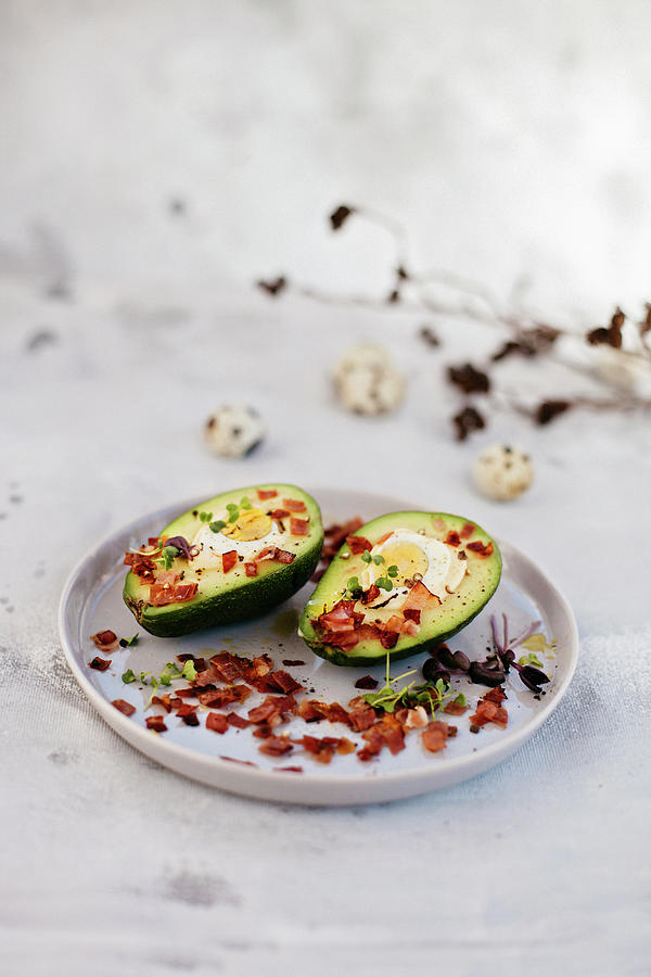 Easter Avocados Stuffed With Quail Eggs Photograph by Giedre Barauskiene