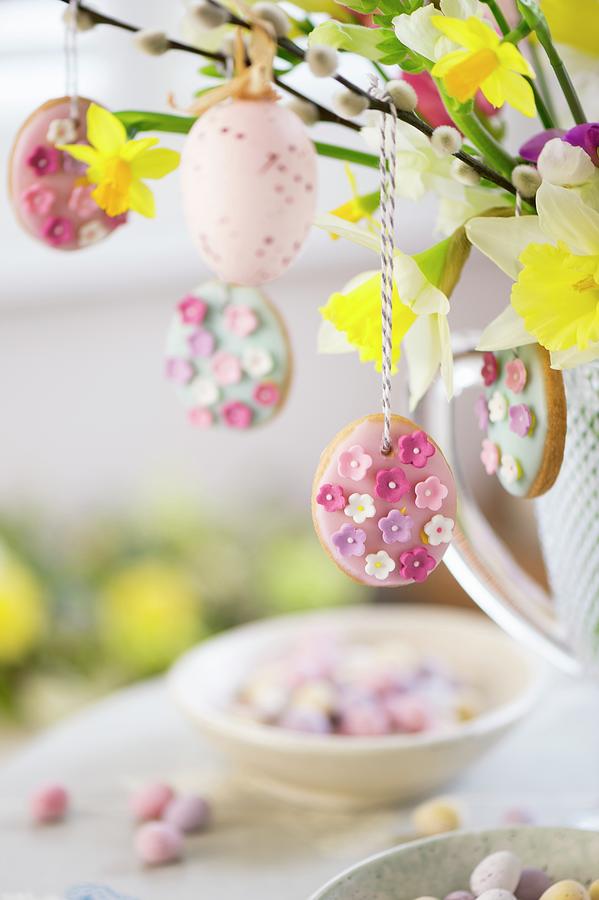 Easter Biscuits Hanging From Spring Twigs Photograph by Winfried Heinze
