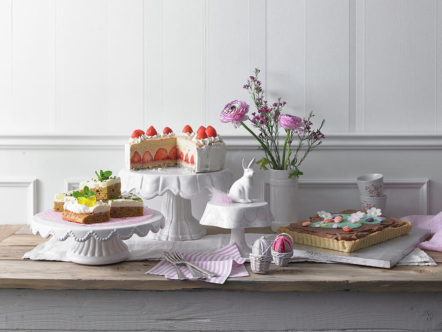 Easter Cake Buffet With Caramel And Strawberry Cake, Almond Nougat Tart And Carrot Cake Photograph by Jan-peter Westermann