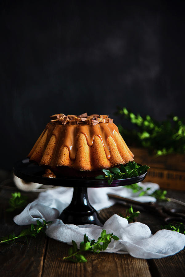 Easter Cake With Caramel And Snickers Photograph by Karolina Polkowska