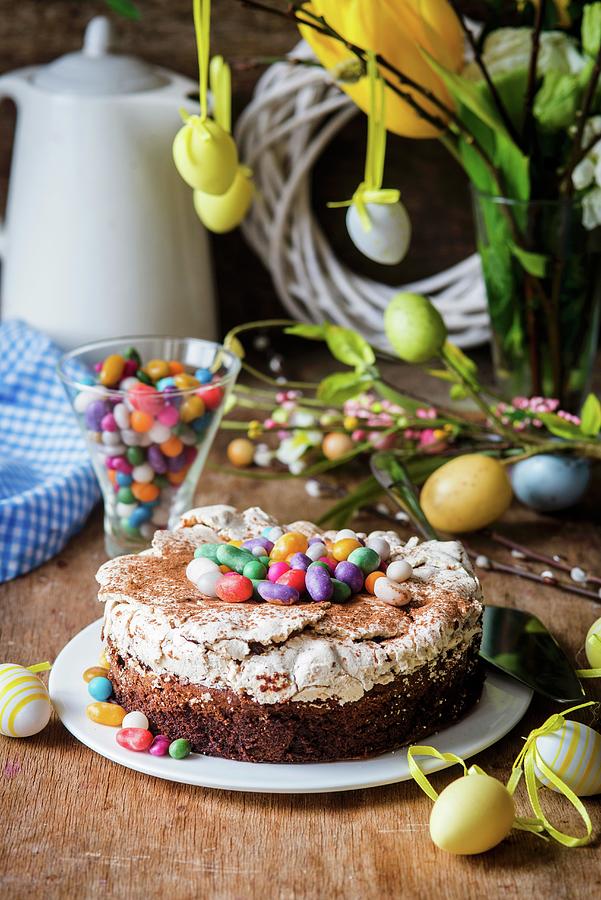 Easter Cake With Chocolate, Meringue And Colourful Easter Eggs Photograph by Irina Meliukh