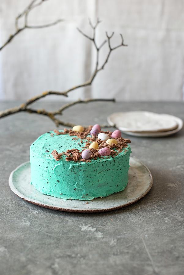 Easter Cake With Mini Eggs And Chocolate Shavings Photograph by Sarka Babicka