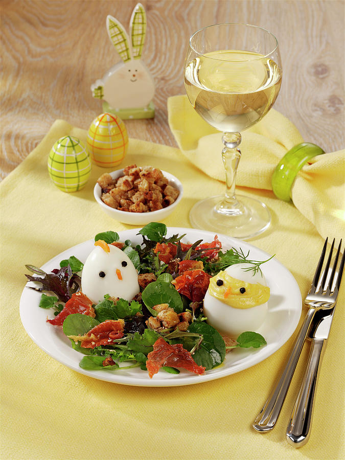 Easter Chicks: Hard-boiled Eggs On Lettuce Photograph by Photoart / Stockfood Studios