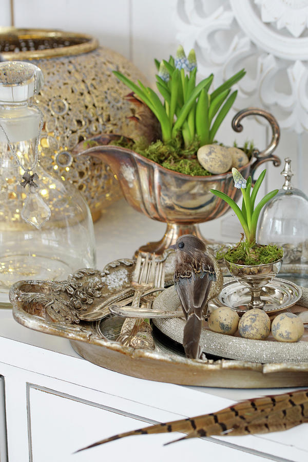 Easter Decoration With A Bird Figure, Eggs, And Grape Hyacinth Photograph by Angelica Linnhoff