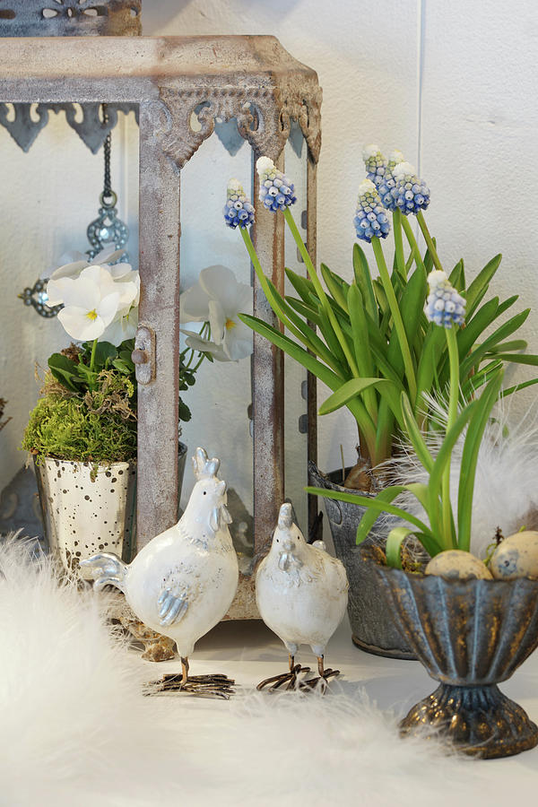 Easter Decoration With Grape Hyacinths, Horned Violets, Chickens, And Easter Eggs Photograph by Angelica Linnhoff