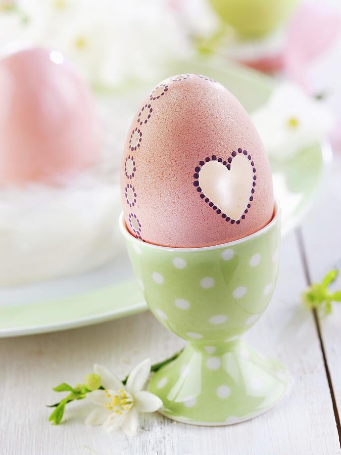 Easter Egg Decorated With Heart In Eggcup Photograph by Stephanie Gayer