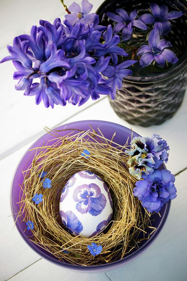 Easter Egg Decorated With Purple Napkin Decoupage Viola In Straw Nest Photograph by Angelica Linnhoff
