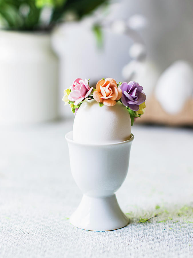 Easter Egg With Flower Decoration In An Eggcup Photograph by Maria Squires