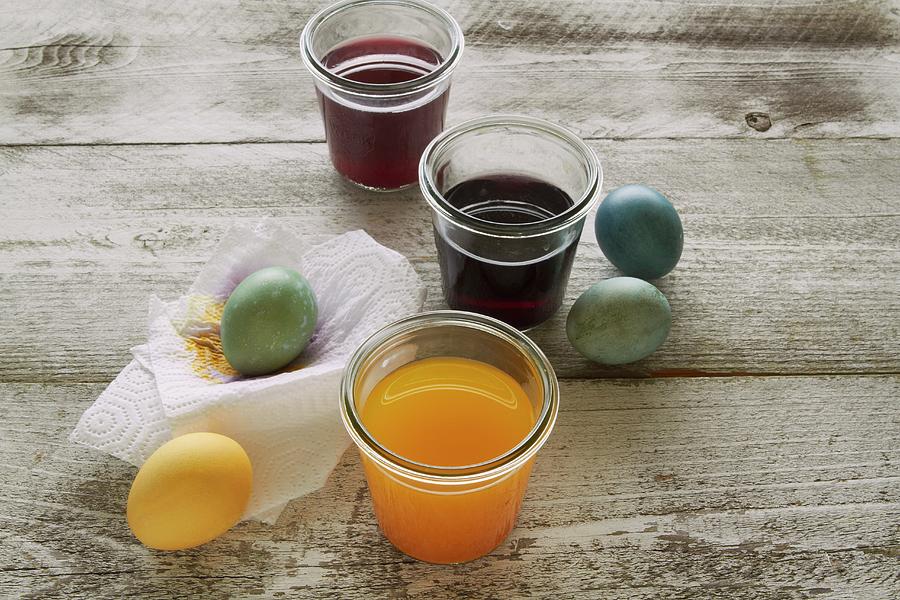 Easter Eggs And Food Colouring Photograph by Rose Hodges