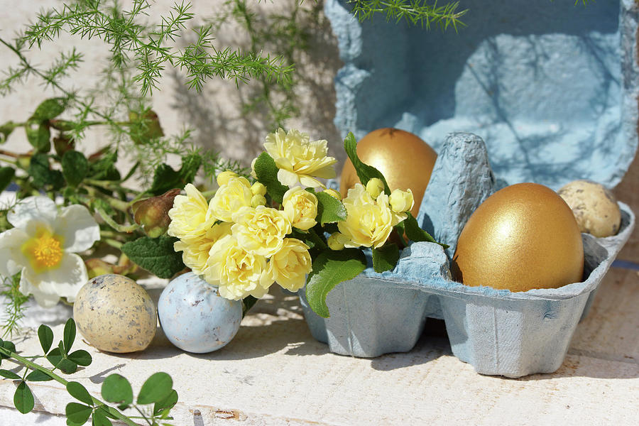 Easter Eggs, Primulas And Rose Branches Photograph by Angelica Linnhoff