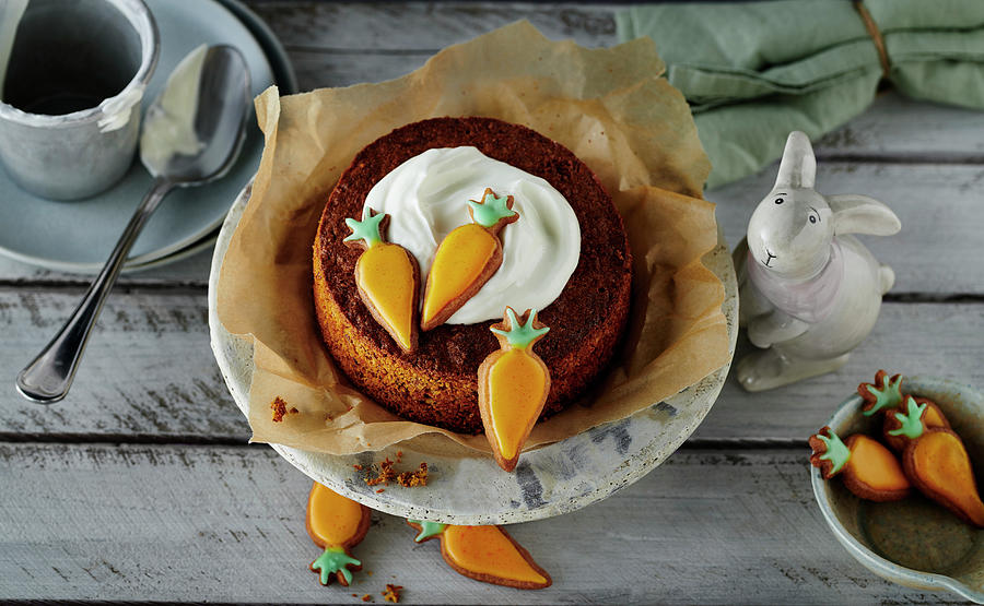 Easter Mini-carrot Cake Decorated With Carrot-shaped Cookies Photograph by Stefan Schulte-ladbeck