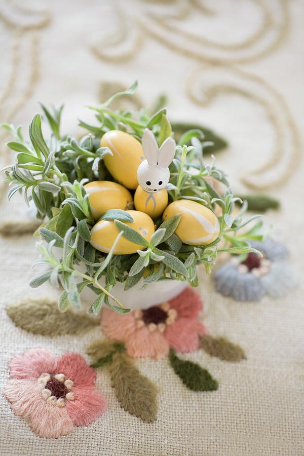 Easter Nest Made From Planted Pot With Rabbit Ornament And Wooden Eggs On Embroidered Vintage Tablecloth Photograph by Alicja Koll