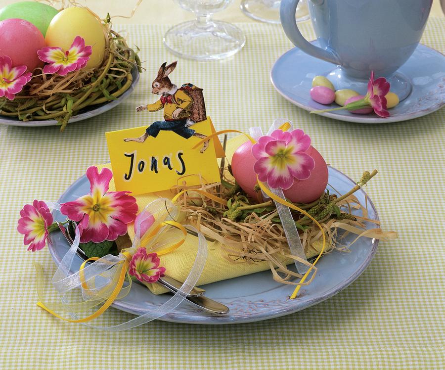 Easter Place-setting With Primulas, Hay, Easter Egg & Place Card Photograph by Strauss, Friedrich