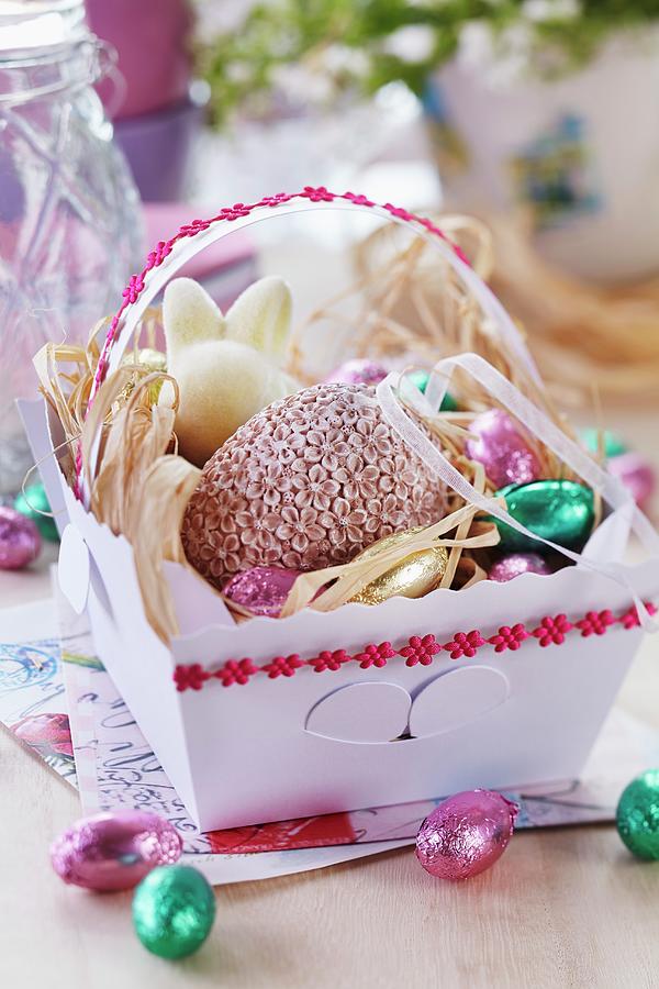 Easter Sweets In Paper Basket Decorated With Floral Ribbonr Photograph by Franziska Taube