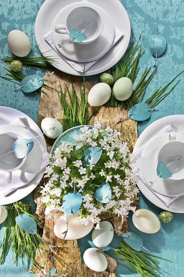 Easter Table Set With Birch Bark And Blades Of Grass On Blue Wallpaper Photograph by Angela Francisca Endress