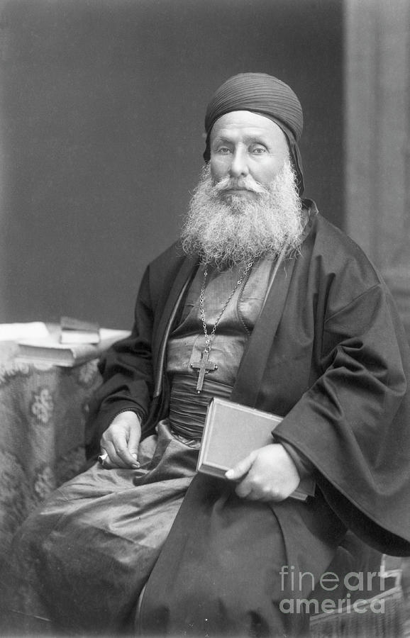 Eastern Christian Clergyman Seated Photograph by Bettmann