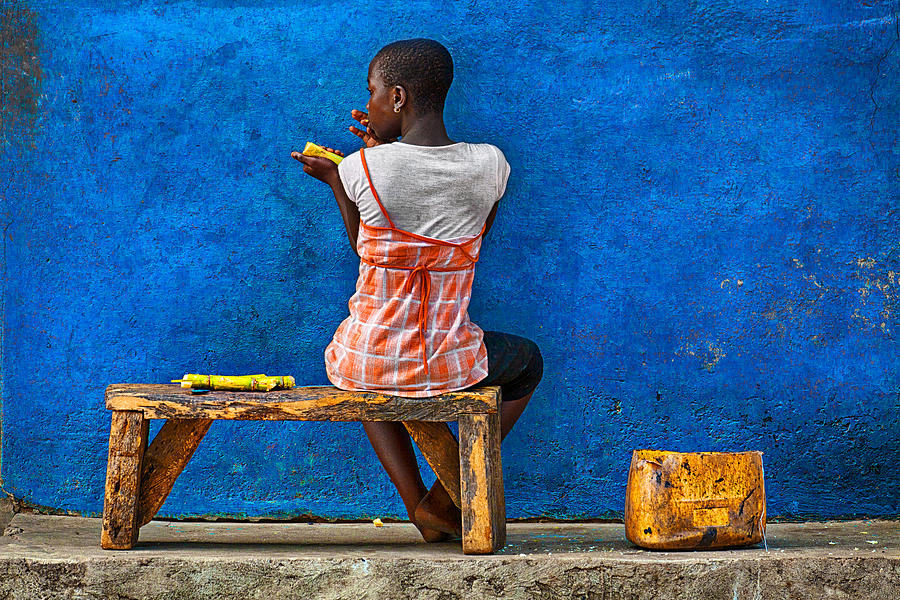 Blue Photograph - Eating Sugar Cane by Sergio Pandolfini
