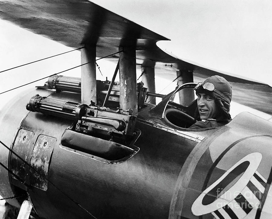 Eddie Rickenbacker Sitting In Biplane Photograph by Bettmann