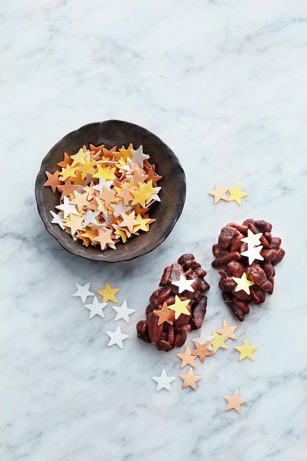 Edible Paper Stars As Sprinkling Decorations Photograph by Mathias Stockfood Studios / Neubauer