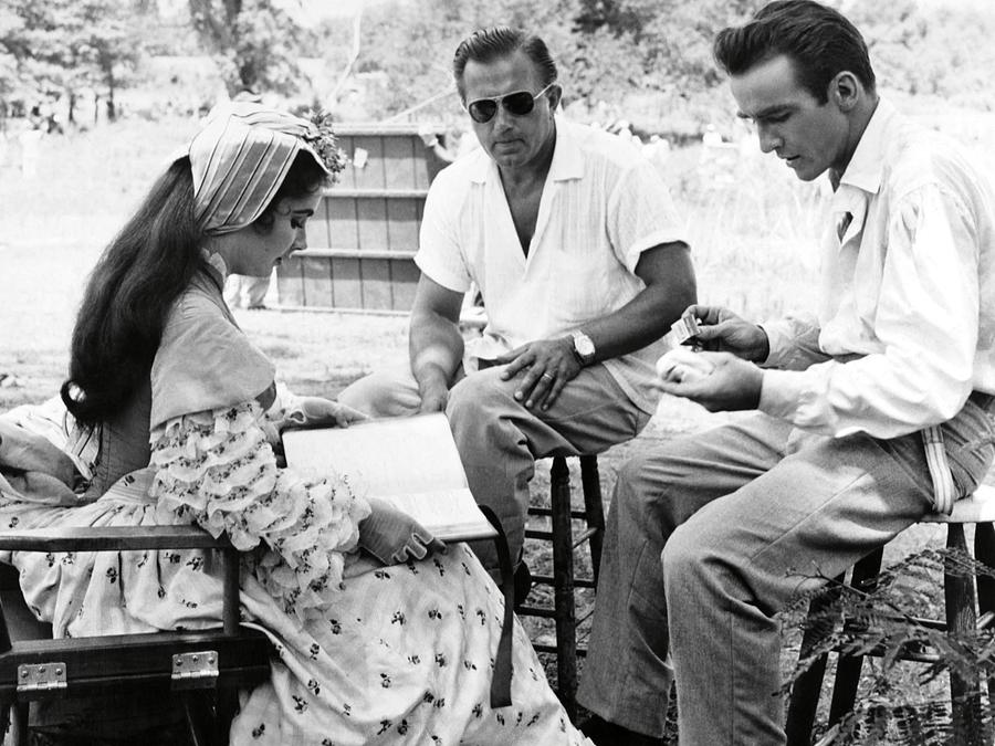 EDWARD DMYTRYK , ELIZABETH TAYLOR and MONTGOMERY CLIFT in RAINTREE COUNTY -1957-. Photograph by Album