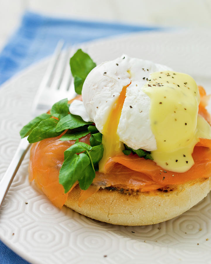 Egg Florentine - Poached Egg With Runny Yoke And Bechamel Sauce, On Spinach And Smoked Salmon, Served On A Toasted Muffin Photograph by Clive Sherlock