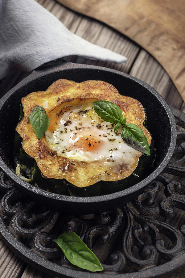 Egg In A Hole fried Egg In A Roasted Acorn Squash Photograph by Andrey Maslakov