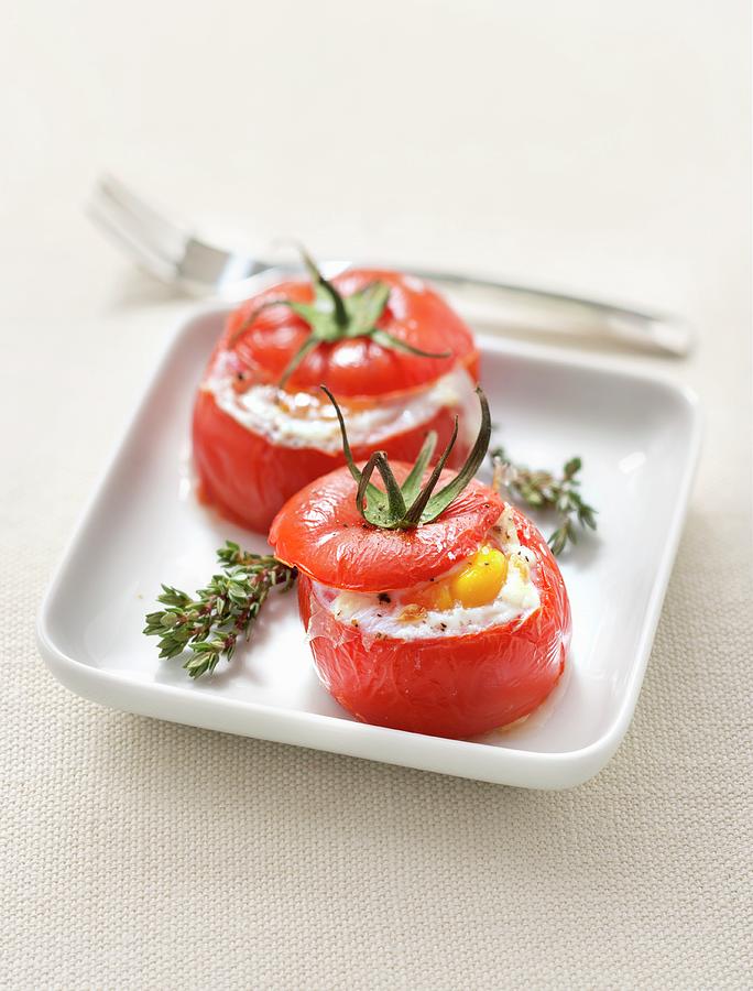 Eggs Baked In Tomatoes Photograph by Studio