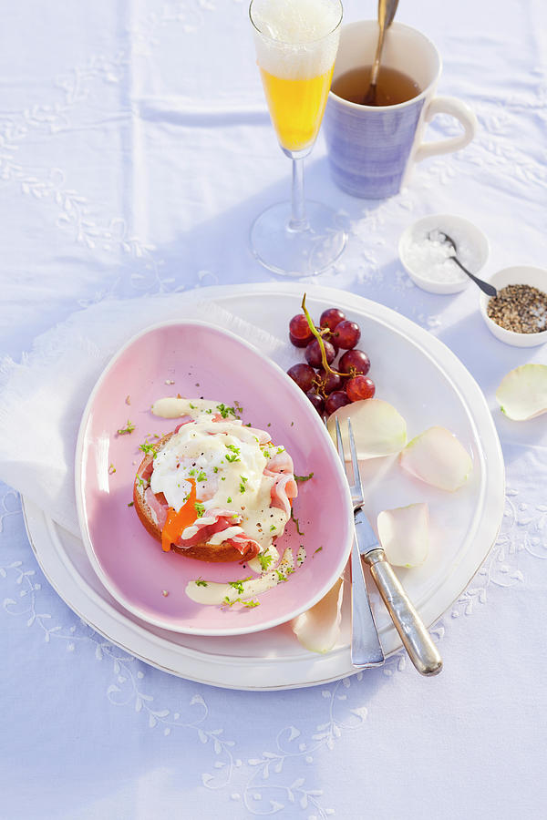 Eggs Benedict With Parsley Photograph by Peter Kooijman