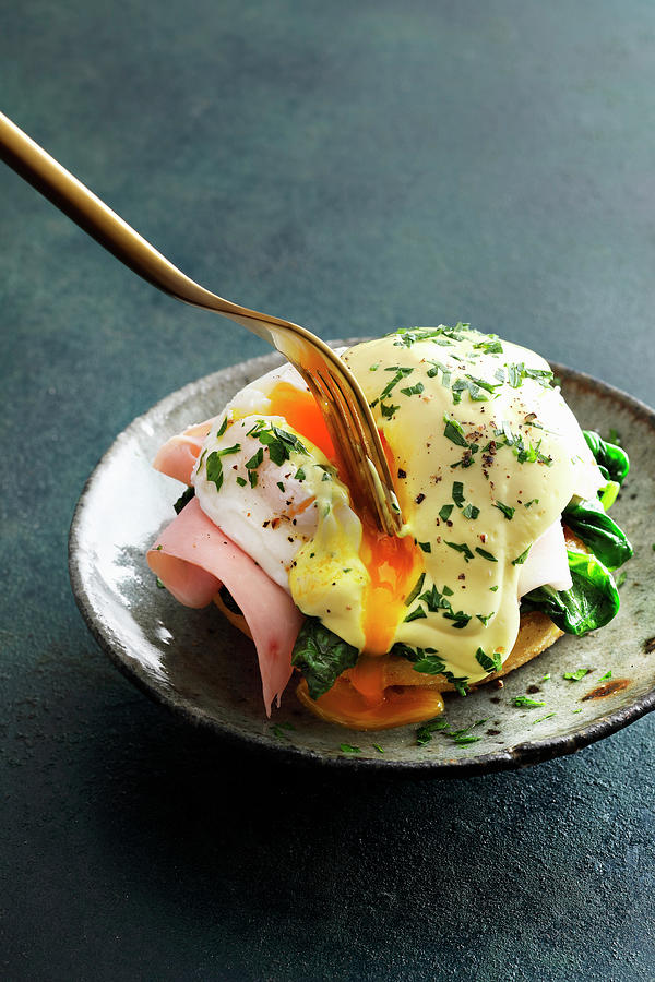 Eggs Benedict With Spinach Photograph by Jalag / Mathias Neubauer