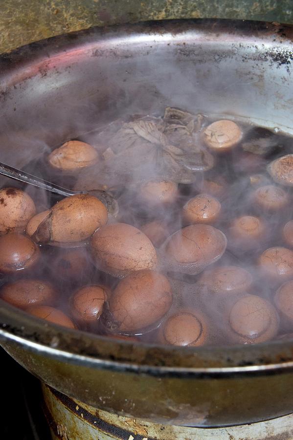 Eggs Boiled In Tea At A Market In China Photograph by Martina Schindler