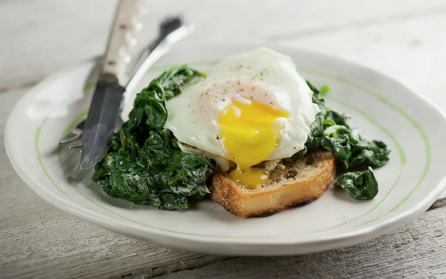 Eggs Florentine With Spinach Photograph by Framed Cooks Photography