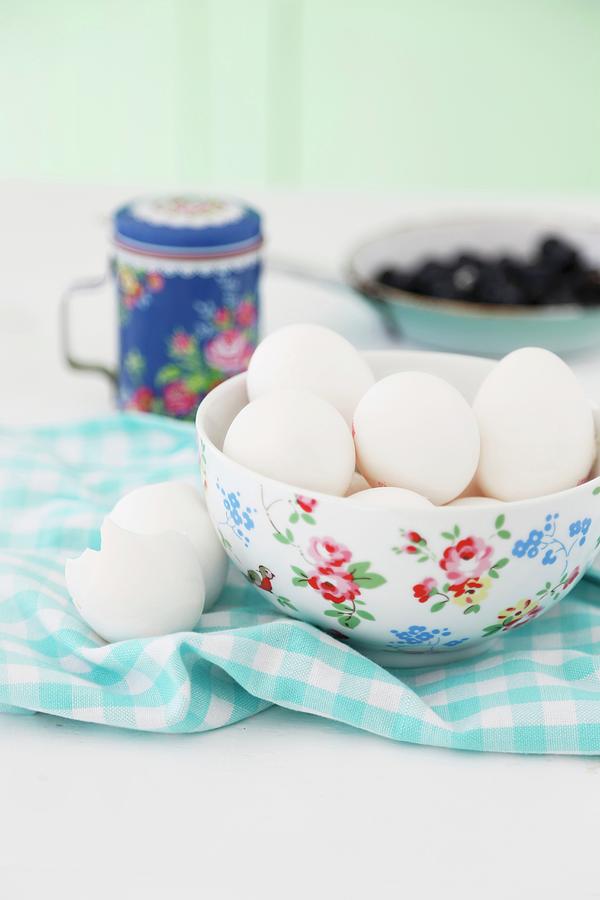 Eggs In A Floral Porcelain Bowl On A Checked Napkin With Egg Shells Next To It Photograph by Syl Loves
