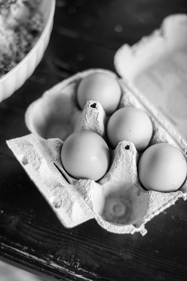 Eggs In An Egg Box Photograph by Eising Studio
