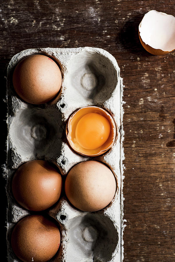 Eggs In An Egg Box Photograph by Mateusz Siuta