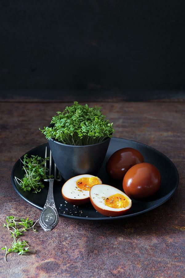 Eggs Marinated In Soy Sauce With Fresh Cress Photograph by Alena Hrbkov
