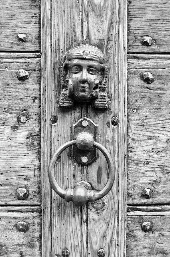 Egyptian Motif Bronze Door Knocker and Nails Rome Italy Black and White Photograph by Shawn OBrien