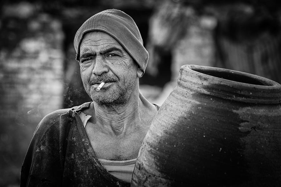 Egyptian Pottery Man Photograph by Ali Khataw