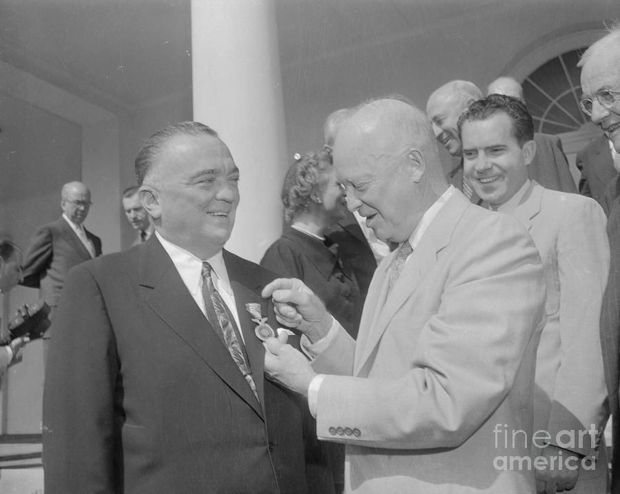 Eisenhower Giving J. Edgar Hoover Photograph by Bettmann