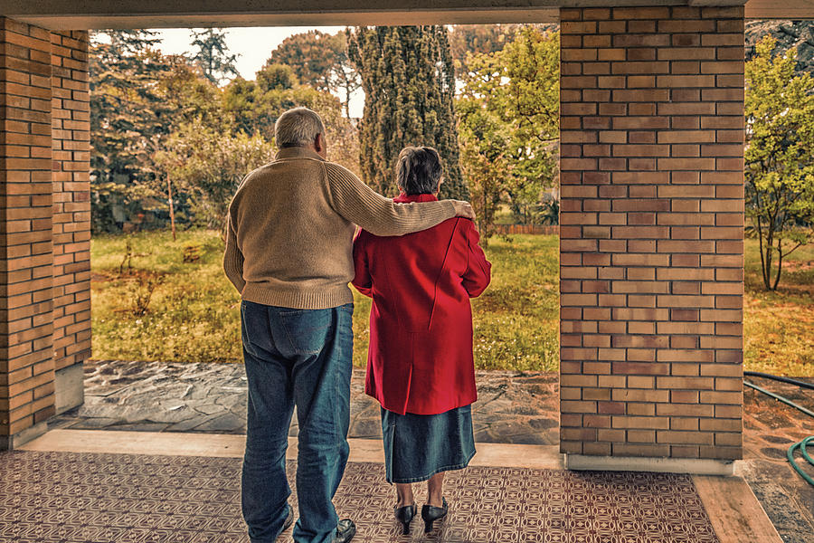 Elderly Couple Hugging Each Other Photograph by Vivida Photo PC